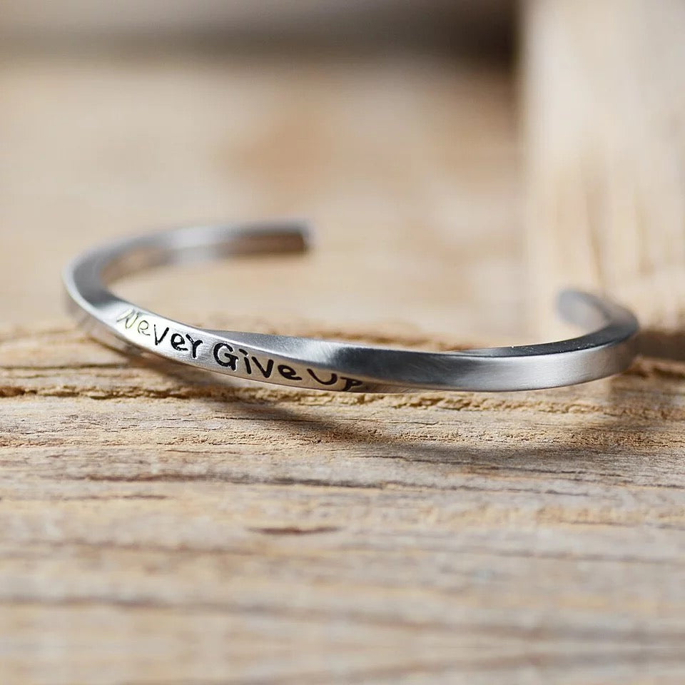 Twisted "Never Give Up" Cuff Bracelet